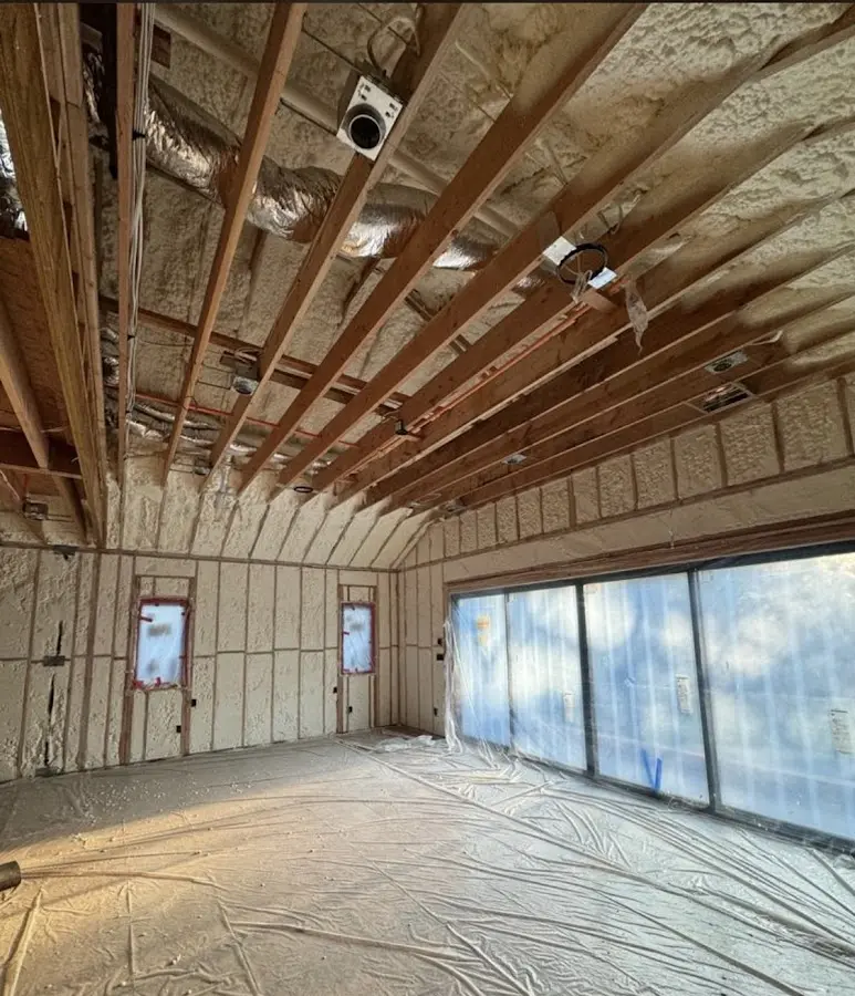 Interior walls and ceiling insulated with spray foam during new construction in Maple Heights